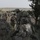 Dismounts prepare to advance on an objective