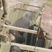 Dismount squad advances through a trench during platoon live fire exercises