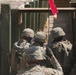 Dismounted team advances through a trench during platoon live fire exercises