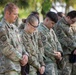Members from the Idaho Military Division pause together to remember 9/11