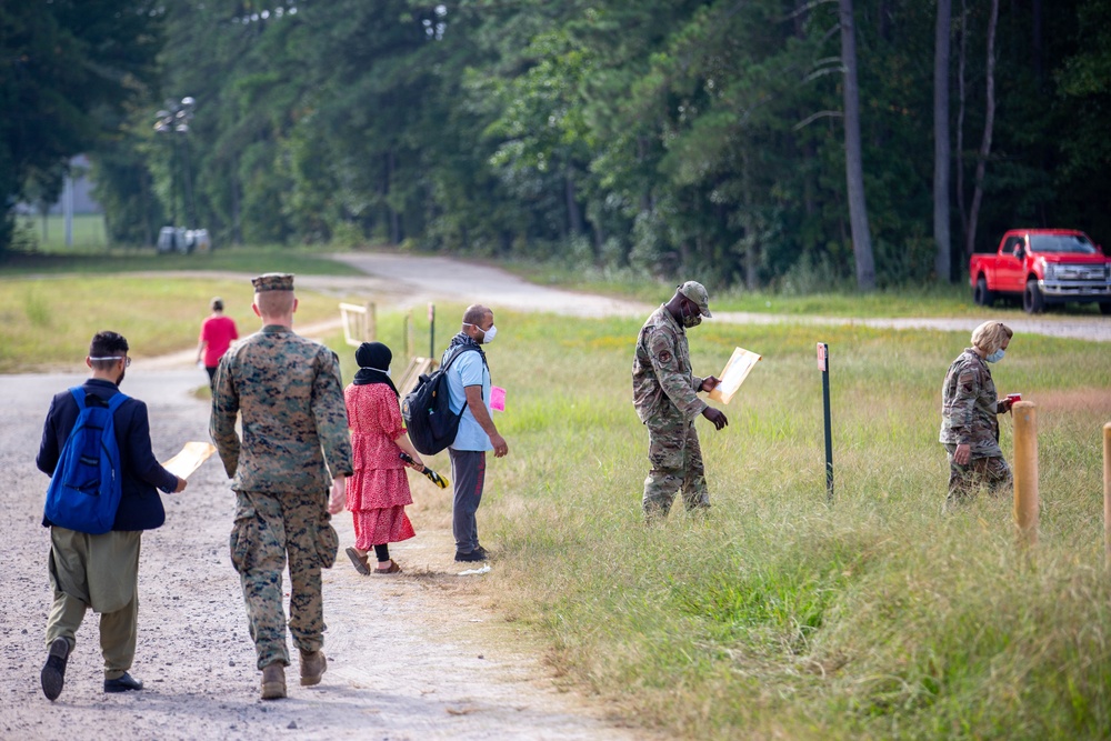 U.S. service members at Fort Pickett guide Afghans to medical screening