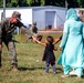 U.S. service members at Fort Pickett provide medical screening and vaccinations to Afghan civilians