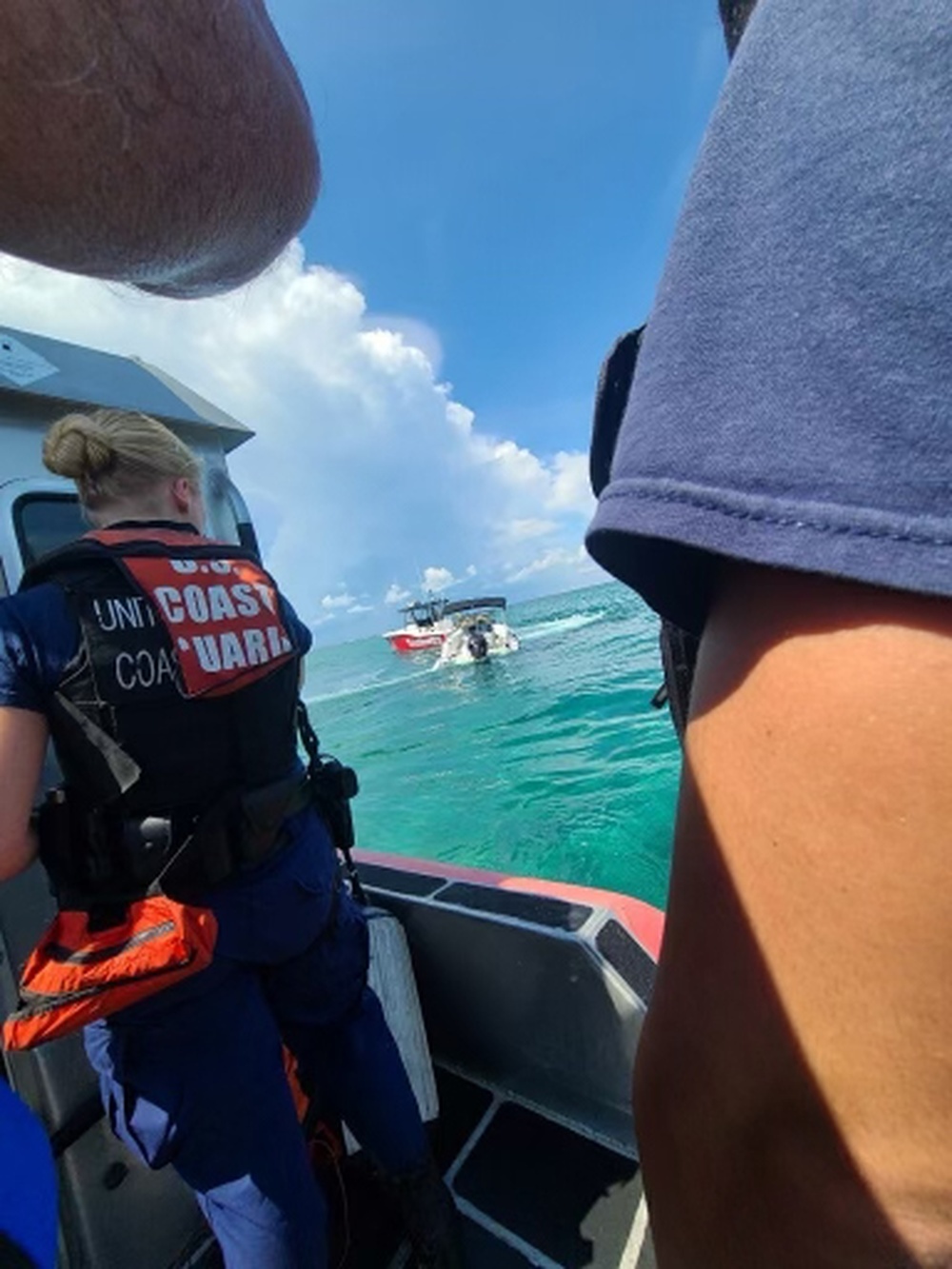 Dvids Images Coast Guard Rescues 3 People From Vessel Taking On