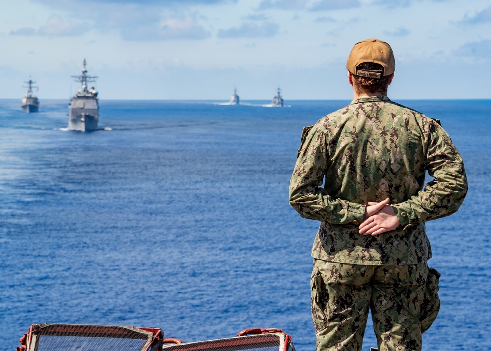 USS Carl Vinson (CVN 70) conducts passing honors ceremony with Japan Maritime Self-Defense Force