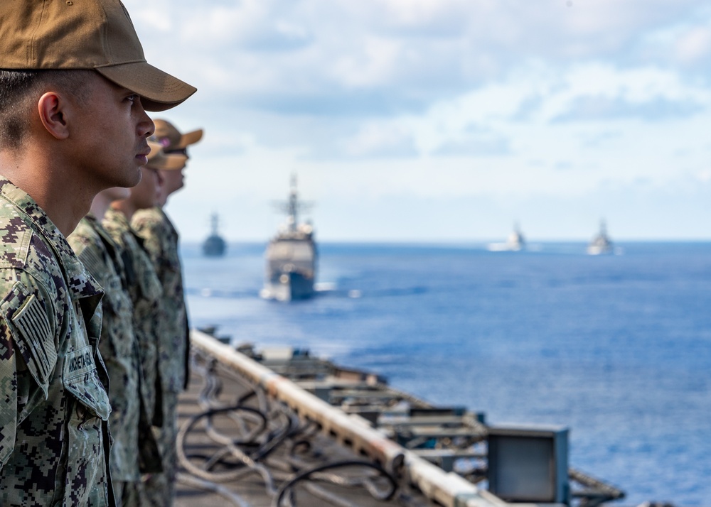 USS Carl Vinson (CVN 70) conducts passing honors ceremony with Japan Maritime Self-Defense Force