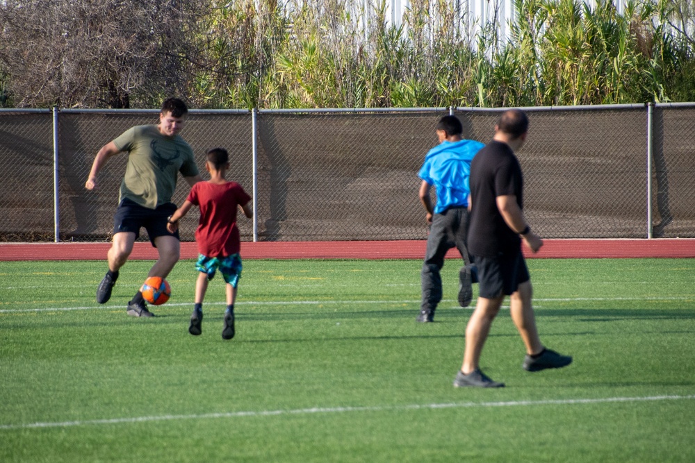 Evacuees from Afghanistan Play Soccer With NAVSTA Rota Personnel