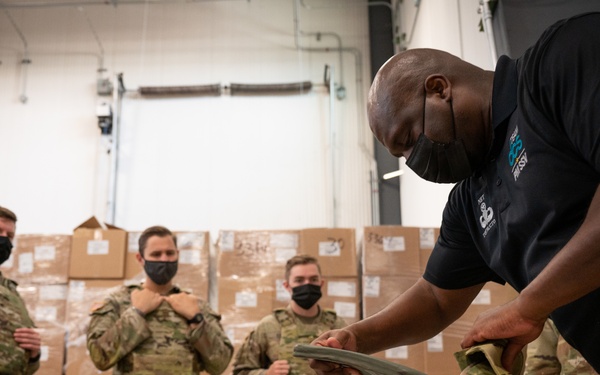 Trainer Slides Plate Into MSV During Fielding