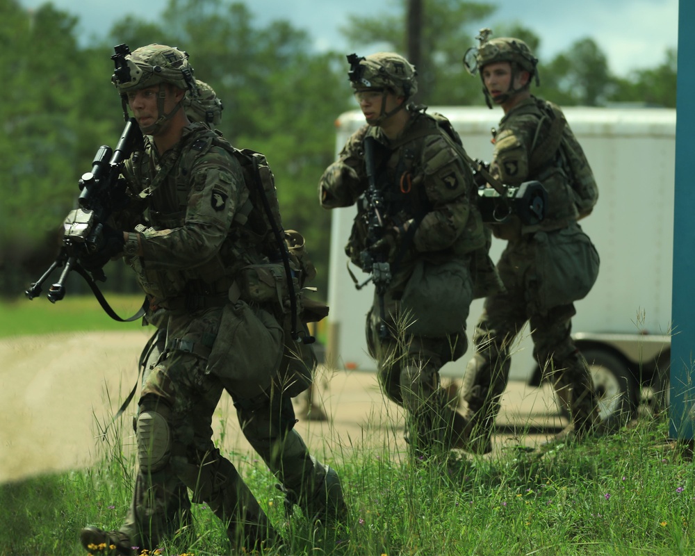 2-506 Infantry Regiment, 3rd Brigade Combat Team, 101st Airborne Division (Air Assault) Soldiers secure a small town from enemy combatants at Joint Readiness Training Center, Fort Polk, LA.