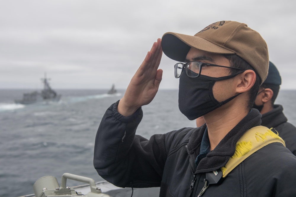 USS Mustin Sailor Salutes Chilean Navy Ships During Exercise Teamwork South