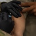 Task Force Holloman administers vaccinations to Afghan evacuees
