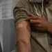 Task Force Holloman administers vaccinations to Afghan evacuees