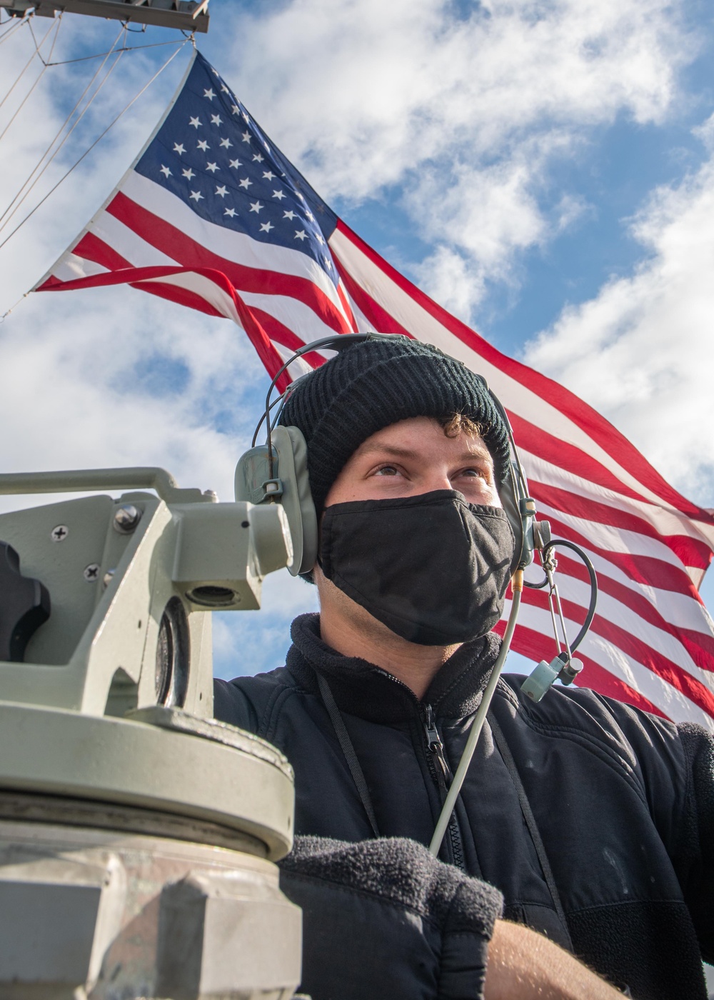 USS Mustin Sailor Stands Lookout Watch