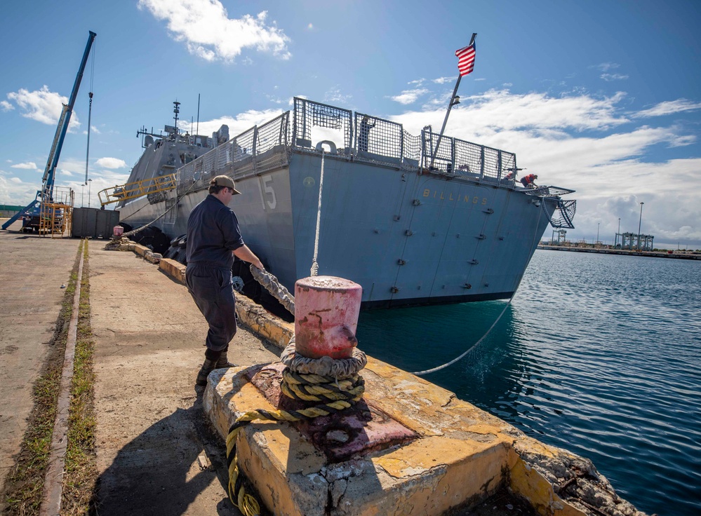 USS Billings Sailor Removes a Line From the Pier During Sea and Anchor Detail