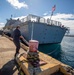 USS Billings Sailor Removes a Line From the Pier During Sea and Anchor Detail