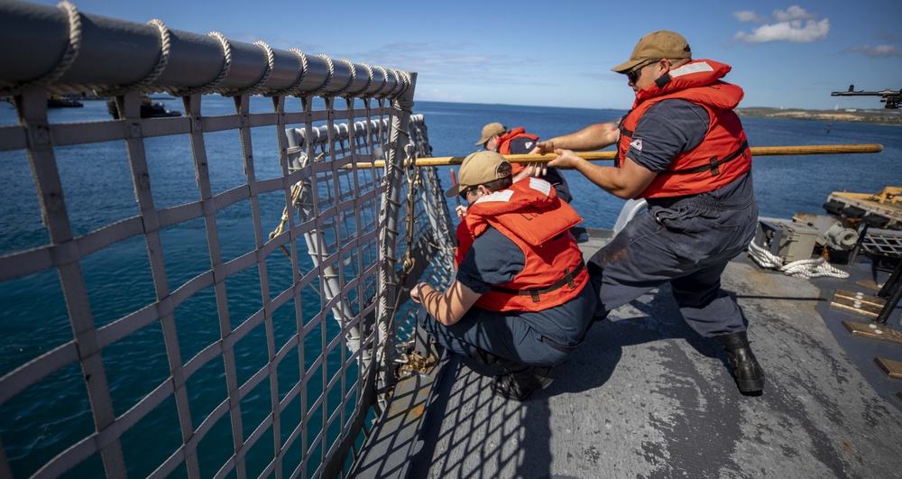 USS Billings Sailors Raise the Flight Deck Nets
