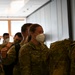 U.S. Airmen arrive at RAF Mildenhall after returning from a deployment