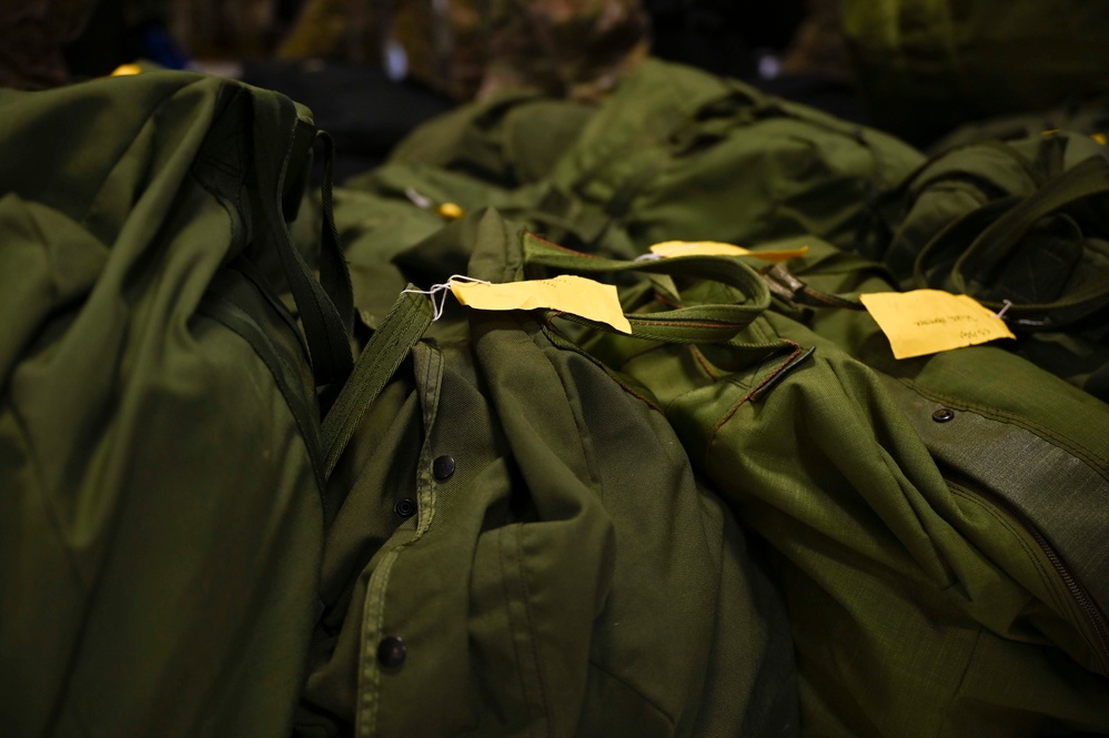 U.S. Airmen arrive at RAF Mildenhall after returning from a deployment