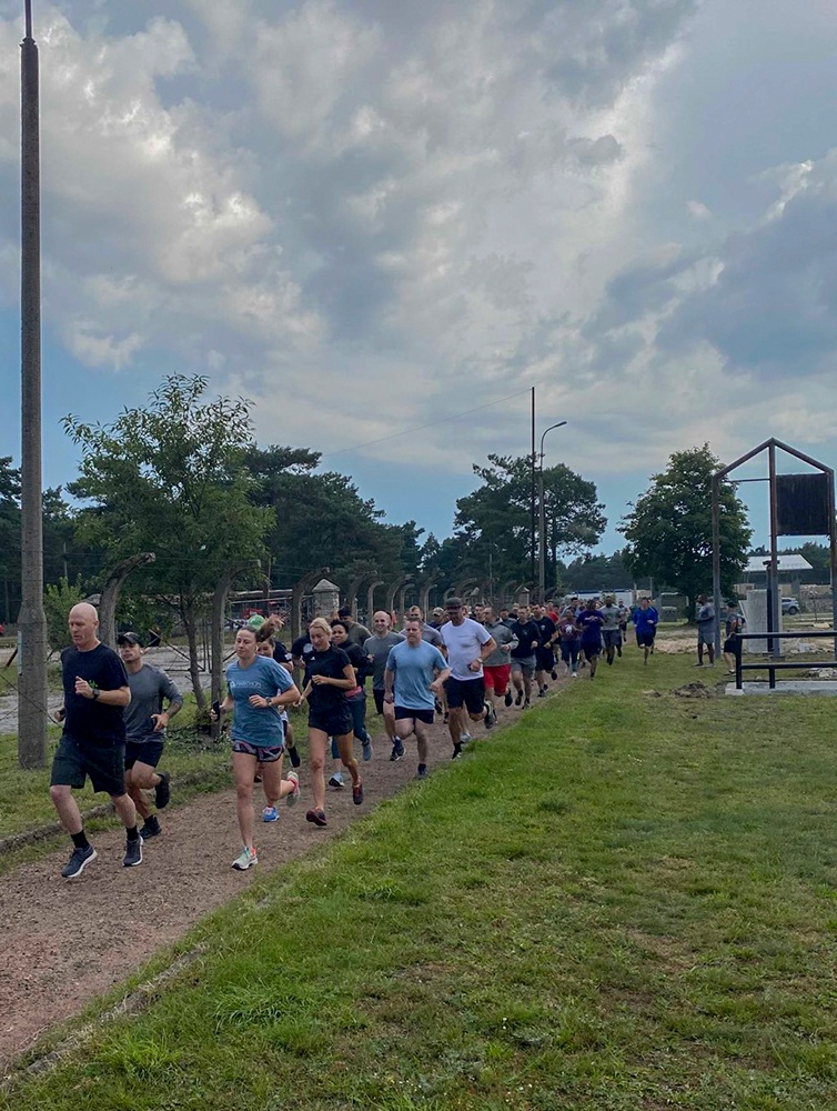 Deployed Soldiers run together in remembrance of 9/11 in Zagan, Poland