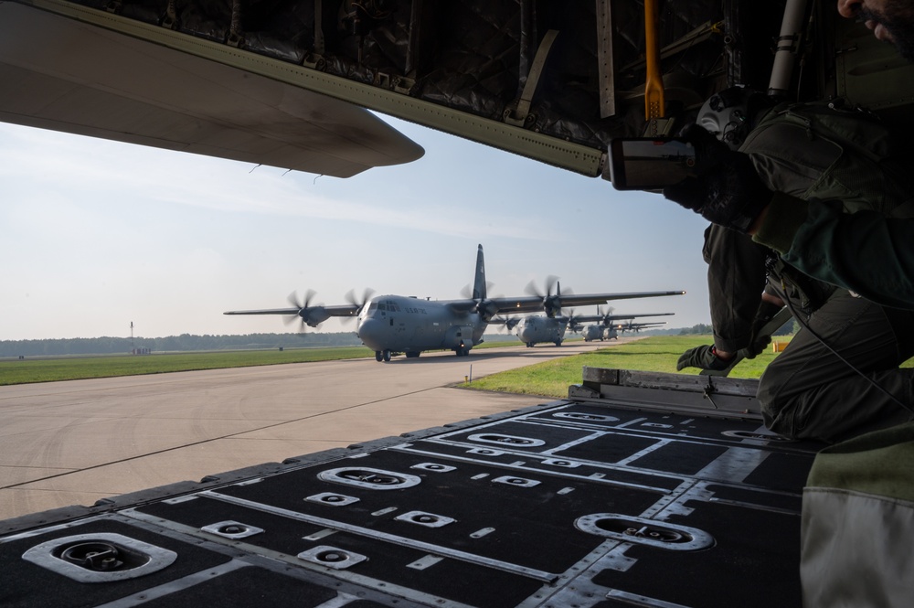 U.S. Airmen jump alongside NATO partners during Falcon Leap 21