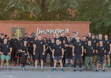 U.S. and Lithuanian Soldiers run together in remembrance of 9/11