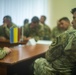 Col. Michael Hanson speaks with LitPolUkr brigade commander