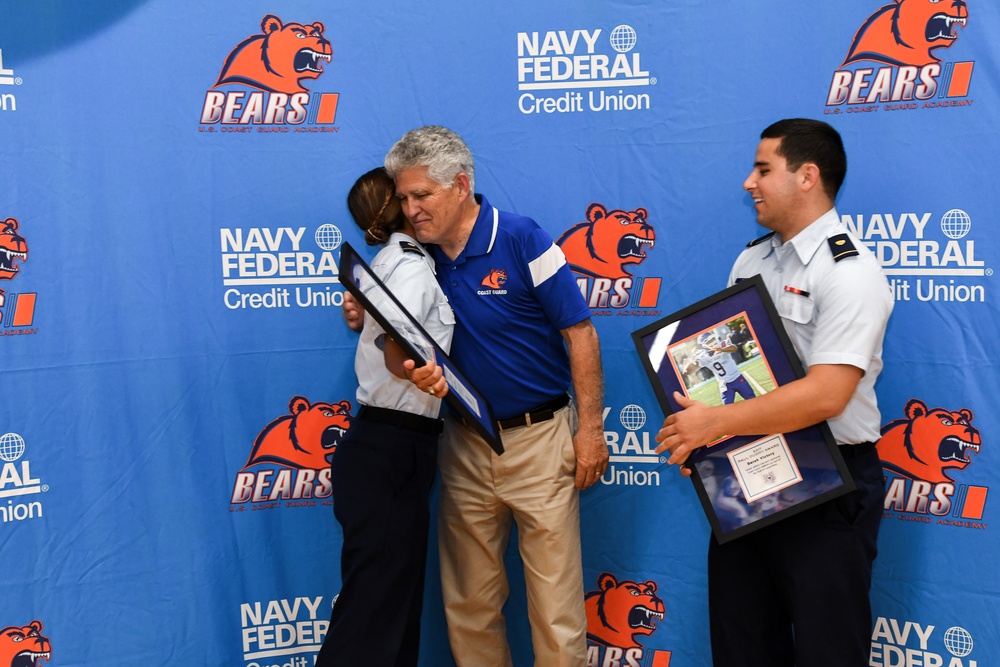 Paul Duddy presents award at Coast Guard Academy