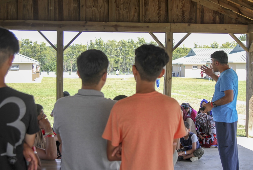 Afghan guests hold a class to Speak English and learn American culture.
