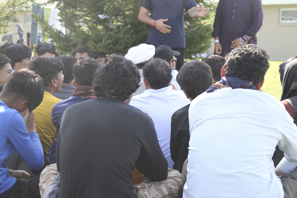 Afghan guests hold a class to Speak English and learn American culture.