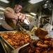 USS Sioux City Culinary Specialist Prepares for Pizza and Wings Night