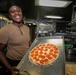 USS Sioux City Culinary Specialist Prepares a Pizza for Pizza and Wings Night
