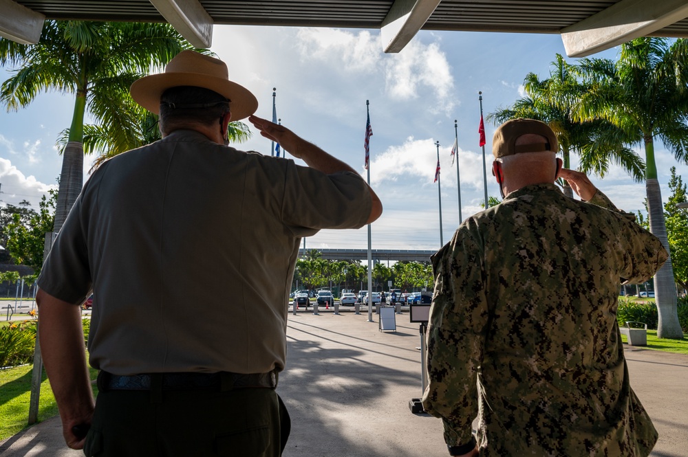 Commander Navy Region Hawaii Observes Colors At Pearl Harbor Historic Sites Visitor Center