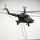 Ukrainian soldiers fast rope from a MI-8 helicopter