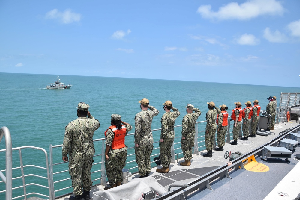 USNS Burlington's Military Det Renders Honors to Suriname Coast Guard During a Passex