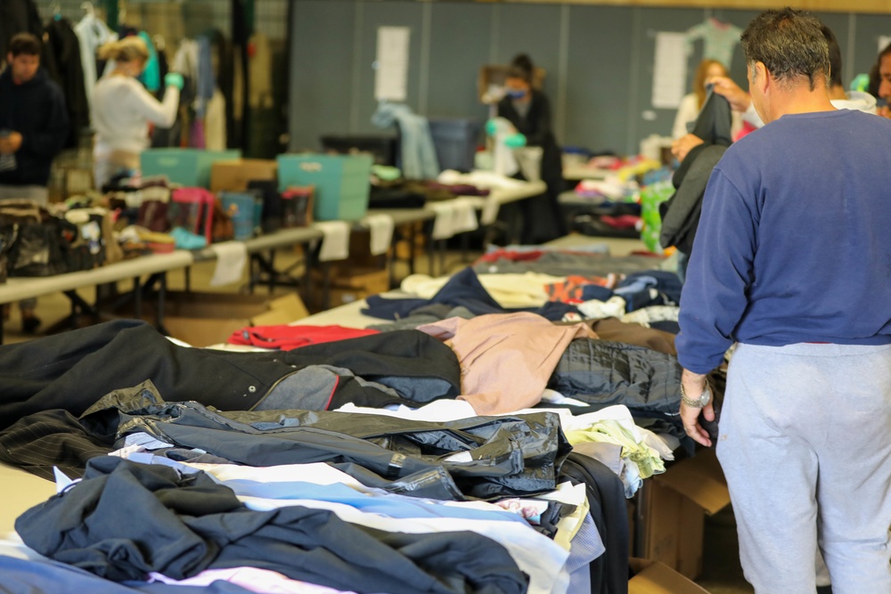 Afghan evacuees receive cold weather clothes