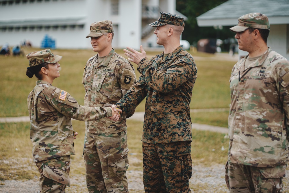 U.S. Service Members receive challenge coins