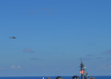 USS Lake Champlain (CG 57) Receives Passing Honors from JMSDF