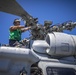 HSC 28 Sailor Conducts Maintenance on an MH-60S Sea Hawk Helicopter