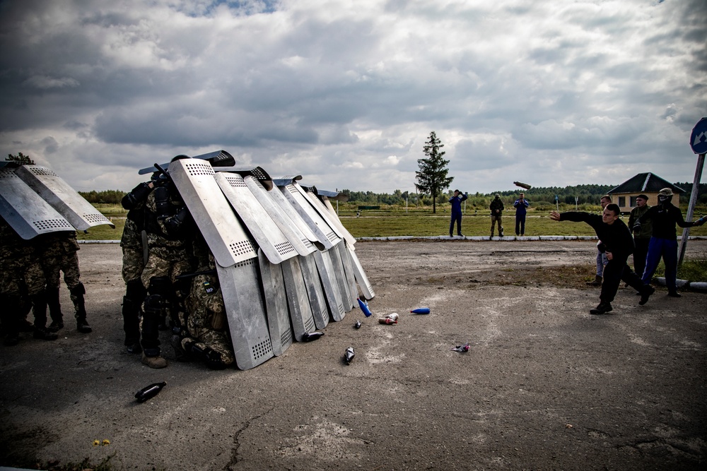 Ukrainian MPs train in crowd control techniques during Rapid Trident 21