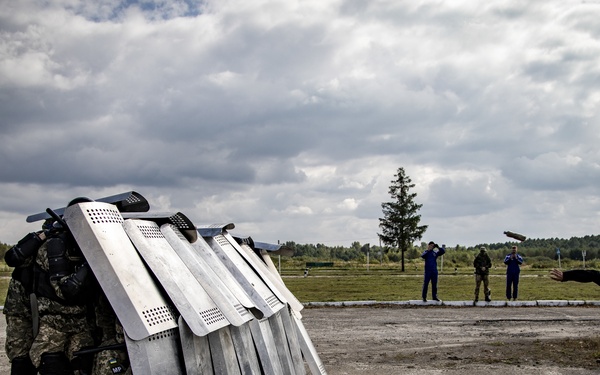 Ukrainian MPs train in crowd control techniques during Rapid Trident 21