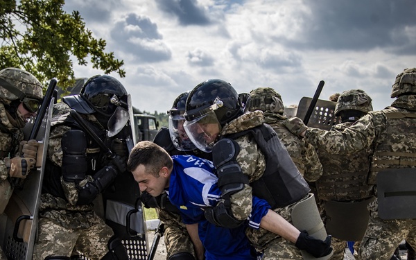 Ukrainian MPs train in crowd control techniques during Rapid Trident 21