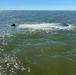 Coast Guard, good samaritan rescue 3 after vessel capsizes near Red Fish Island, Texas