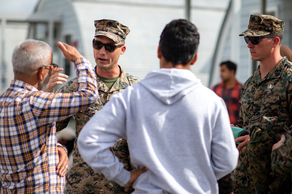 Marines at TF Quantico interact with Afghans
