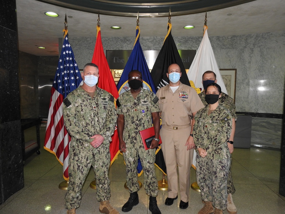 NML&amp;PDC's LCDR Rodney Noah is awarded the Purple Heart medal