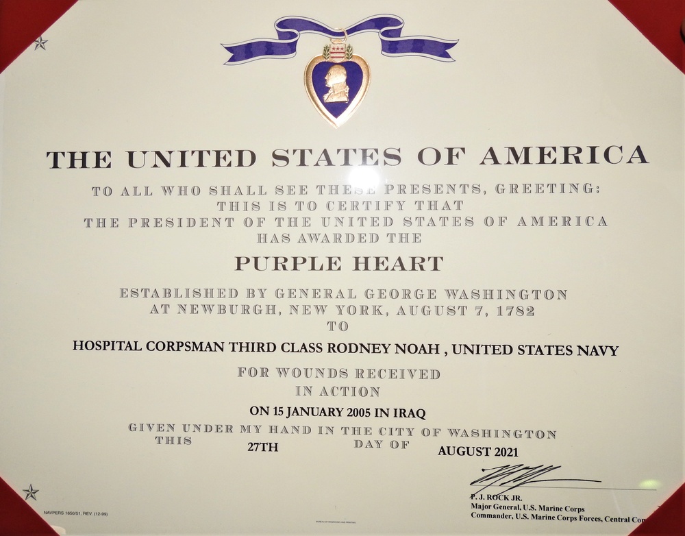 NML&amp;PDC's LCDR Rodney Noah is awarded the Purple Heart medal