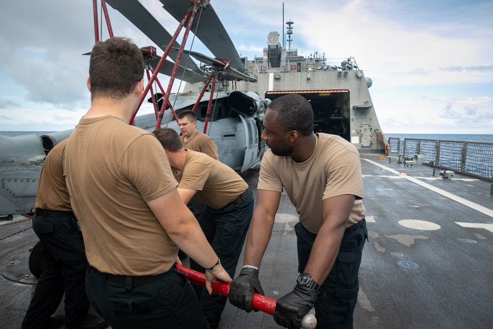 HSC 22 Sailors Prepare an MH-60S Sea Hawk Helicopter Prior to Launch