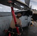 HSC 22 Sailor Prepares to Spread the Rotor Blades an MH-60S Sea Hawk Helicopter