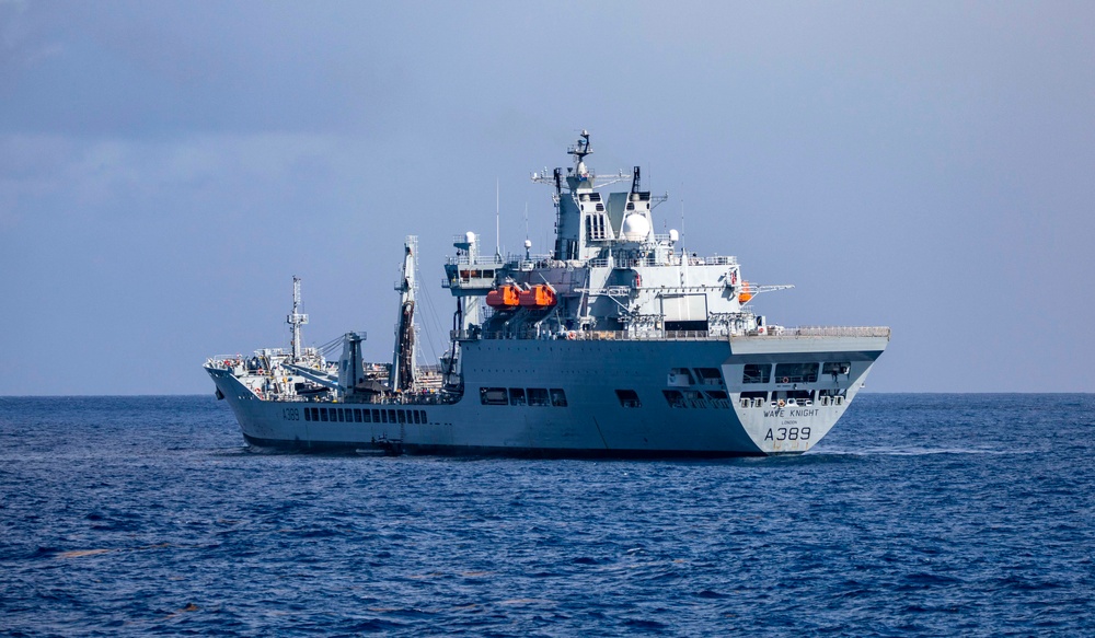 USS Billings Sailors and Embarked Coast Guard Det Pull Alongside RFA Wave Knight During RHIB Ops