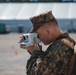 US Marines take Polaroid photos with Afghan Individuals on Fort Pickett