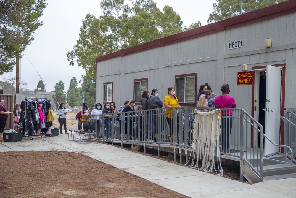 Pendleton residents dress to impress during ball gown giveaway