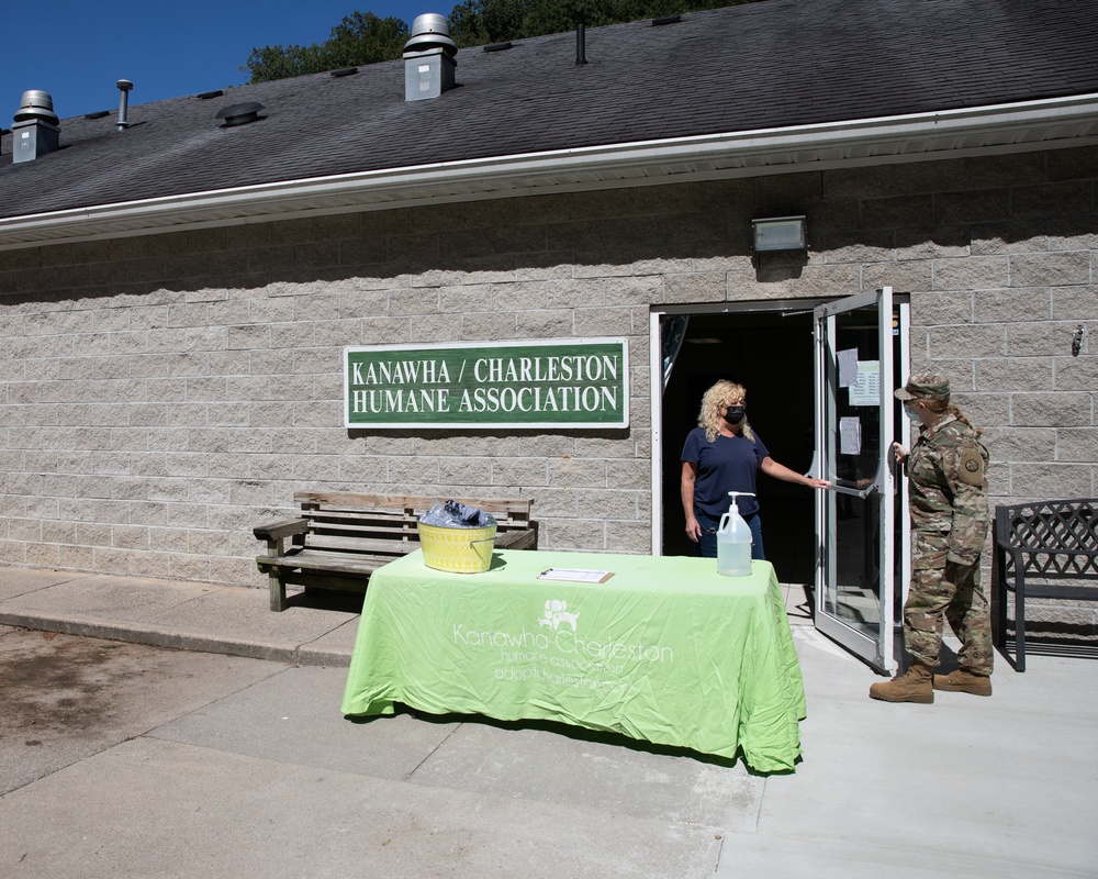 National Guard soldiers work with the Humane Association